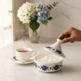 Luhpar White Designer Ceramic Sugar Pot with Elegant Floral Lid for Decorative and Functional Serving – 15×15 cm - Al Kabayel Discount CentreLuhpar White Designer Ceramic Sugar Pot with Elegant Floral Lid for Decorative and Functional Serving – 15×15 cmJars & Food SaversLUHPARAl Kabayel Discount Centre