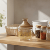 Luxehohe Premium Round Airtight Acrylic Storage Canister – Transparent Body with Elegant Golden Decorative Design, 500 ml - Al Kabayel Discount CentreLuxehohe Premium Round Airtight Acrylic Storage Canister – Transparent Body with Elegant Golden Decorative Design, 500 mlJars & Food SaversLUXEHOMEAl Kabayel Discount Centre