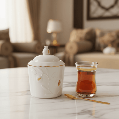 Luxury White Ceramic Sugar Pot with Elegant Gold Trim Design and Fitted Lid – Compact Tabletop Storage Jar (10×8 cm) - Al Kabayel Discount CentreLuxury White Ceramic Sugar Pot with Elegant Gold Trim Design and Fitted Lid – Compact Tabletop Storage Jar (10×8 cm)Jars & Food SaversAKDCAl Kabayel Discount Centre