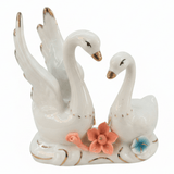 Luxury White Ceramic Swan Table Décor with Multicolour Floral Artwork for Home Decoration – 12×14cm - Al Kabayel Discount CentreLuxury White Ceramic Swan Table Décor with Multicolour Floral Artwork for Home Decoration – 12×14cmHome Décor AccentsAKDCAl Kabayel Discount Centre