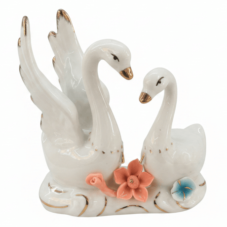 Luxury White Ceramic Swan Table Décor with Multicolour Floral Artwork for Home Decoration – 12×14cm - Al Kabayel Discount CentreLuxury White Ceramic Swan Table Décor with Multicolour Floral Artwork for Home Decoration – 12×14cmHome Décor AccentsAKDCAl Kabayel Discount Centre