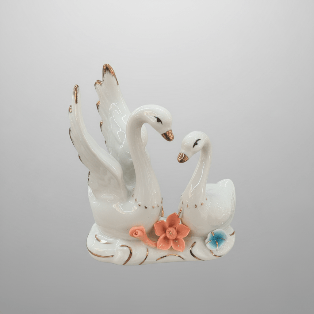 Luxury White Ceramic Swan Table Décor with Multicolour Floral Artwork for Home Decoration – 12×14cm - Al Kabayel Discount CentreLuxury White Ceramic Swan Table Décor with Multicolour Floral Artwork for Home Decoration – 12×14cmHome Décor AccentsAKDCAl Kabayel Discount Centre