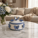 May Flower White Ceramic Candy Pot with Blue Butterfly Design Compact Storage Jar 15x8cm - Al Kabayel Discount CentreMay Flower White Ceramic Candy Pot with Blue Butterfly Design Compact Storage Jar 15x8cmJars & Food SaversMAY FLOWERAl Kabayel Discount Centre