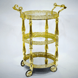 MayFlower 3-Tier Round Gold Metal & Glass Serving Trolley with Ornate Filigree Design and Caster Wheels – 90×50cm | Luxury Hospitality & Majlis Tea Cart | - Al Kabayel Discount CentreMayFlower 3-Tier Round Gold Metal & Glass Serving Trolley with Ornate Filigree Design and Caster Wheels – 90×50cm | Luxury Hospitality & Majlis Tea Cart |Organizers & AccessoriesMAYFLOWERAl Kabayel Discount Centre
