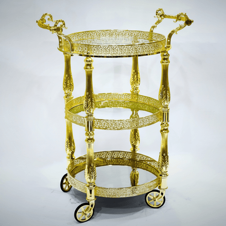 MayFlower 3-Tier Round Gold Metal & Glass Serving Trolley with Ornate Filigree Design and Caster Wheels – 90×50cm | Luxury Hospitality & Majlis Tea Cart | - Al Kabayel Discount CentreMayFlower 3-Tier Round Gold Metal & Glass Serving Trolley with Ornate Filigree Design and Caster Wheels – 90×50cm | Luxury Hospitality & Majlis Tea Cart |Organizers & AccessoriesMAYFLOWERAl Kabayel Discount Centre