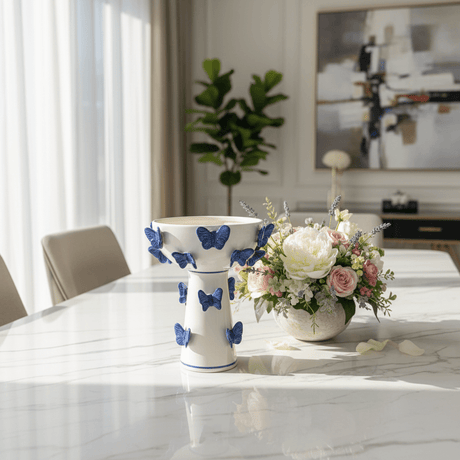 MayFlower Butterfly Bloom White Ceramic Footed Fruit Bowl with Blue Butterfly Design Decorative 25×18cm - Al Kabayel Discount CentreMayFlower Butterfly Bloom White Ceramic Footed Fruit Bowl with Blue Butterfly Design Decorative 25×18cmBowlsMAYFLOWERAl Kabayel Discount Centre