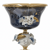 Murano Navy Blue & Gold Metal Footed Glass Fruit Bowl with Porcelain Flower Design for Table Décor – 15 × 14 cm - Al Kabayel Discount CentreMurano Navy Blue & Gold Metal Footed Glass Fruit Bowl with Porcelain Flower Design for Table Décor – 15 × 14 cmBowlsMURANOAl Kabayel Discount Centre