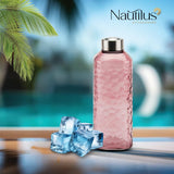 Nautilus Glass Bottle 1000ml Glass, Honeycomp Design , Non - Toxic and Food - Safe Material, Dishwasher Safe ,With metal lid - Transparent Pink - Al Kabayel Discount CentreNautilus Glass Bottle 1000ml Glass, Honeycomp Design , Non - Toxic and Food - Safe Material, Dishwasher Safe ,With metal lid - Transparent PinkKitchen Utensils & GadgetsNAUTILUSAl Kabayel Discount Centre