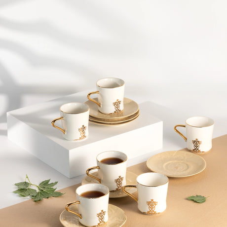 Otantic Naqsh 12pcs Porcelain Tea Set, 6pcs Cups 200ml + 6pcs Saucer, Ivory/White/Gold, ET2952 - Al Kabayel Discount CentreOtantic Naqsh 12pcs Porcelain Tea Set, 6pcs Cups 200ml + 6pcs Saucer, Ivory/White/Gold, ET2952Tea SetsOTANTIKAl Kabayel Discount Centre