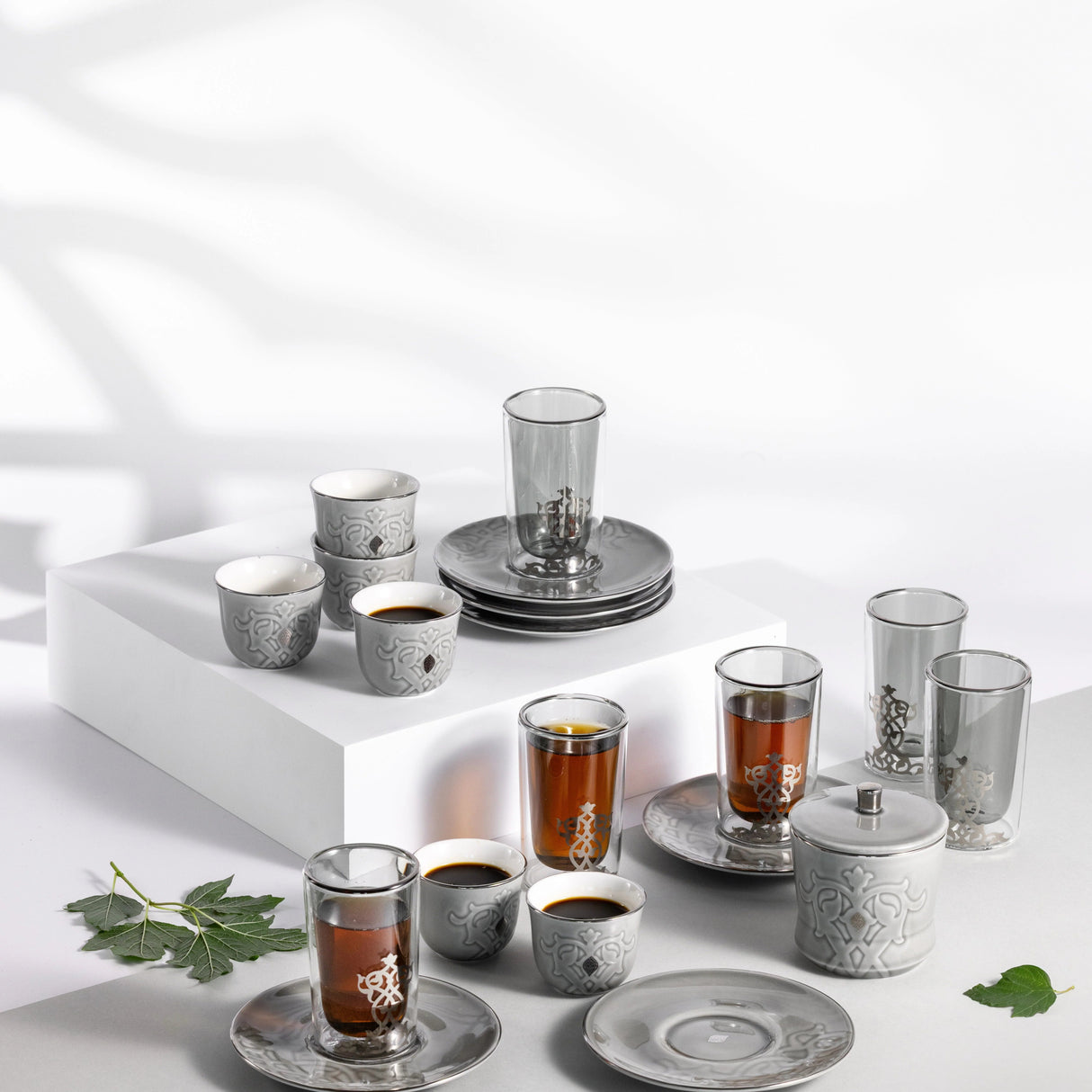 Otantic Naqsh 19pcs Tea & Arabic Coffee Set, 6pcs Double Glass Cups 130ml + 6pc Saucers + 6pcs Arabic Coffee Cup 80ml +1pc Sugar Pot 250ml, Grey/Silver, ET2943 - Al Kabayel Discount CentreOtantic Naqsh 19pcs Tea & Arabic Coffee Set, 6pcs Double Glass Cups 130ml + 6pc Saucers + 6pcs Arabic Coffee Cup 80ml +1pc Sugar Pot 250ml, Grey/Silver, ET2943Tea SetsOTANTIKAl Kabayel Discount Centre
