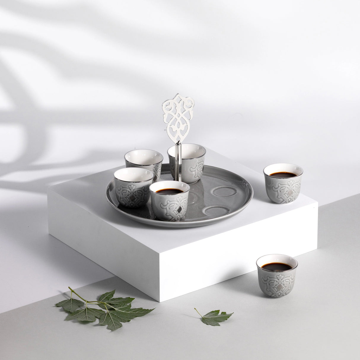 Otantic Naqsh 7pcs Porcelain Arabic Coffee Set, 6pcs Cups 80ml +1pc Standwith Handle, Grey/Silver, ET2968 - Al Kabayel Discount CentreOtantic Naqsh 7pcs Porcelain Arabic Coffee Set, 6pcs Cups 80ml +1pc Standwith Handle, Grey/Silver, ET2968Tea SetsOTANTIKAl Kabayel Discount Centre