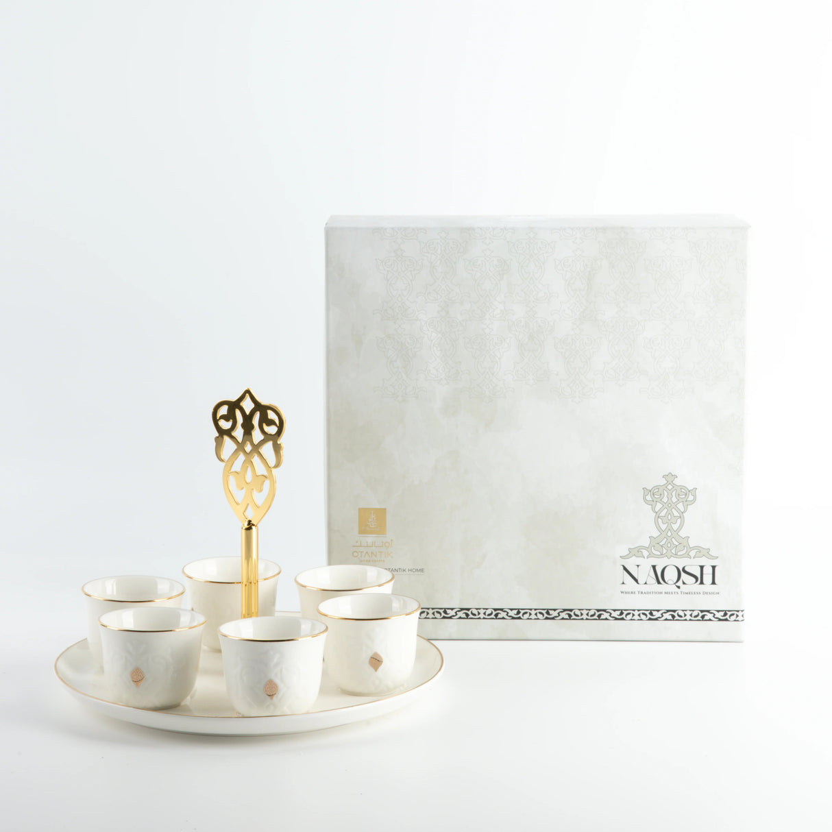 Otantic Naqsh 7pcs Porcelain Arabic Coffee Set, 6pcs Cups 80ml +1pc Standwith Handle, White/Gold, ET2965 - Al Kabayel Discount CentreOtantic Naqsh 7pcs Porcelain Arabic Coffee Set, 6pcs Cups 80ml +1pc Standwith Handle, White/Gold, ET2965Tea SetsOTANTIKAl Kabayel Discount Centre