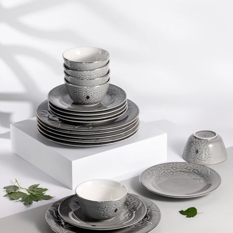 Otantik Naqsh 18pcs Porcelain Dinner Set Includes 10.5" Plate 6pcs+ 7.5" Plate 6pcs+4.75" Bowl 6pcs, Grey/Silver - ET2993 - Al Kabayel Discount CentreOtantik Naqsh 18pcs Porcelain Dinner Set Includes 10.5" Plate 6pcs+ 7.5" Plate 6pcs+4.75" Bowl 6pcs, Grey/Silver - ET2993Dinnerware SetsOTANTIKAl Kabayel Discount Centre