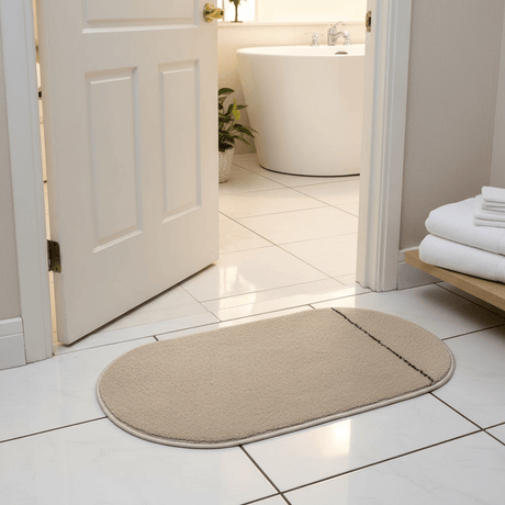 Oval Door Mat | Non-Slip Plush Entrance Rug with Accent Stripe | 62 × 38cm | Beige | Ideal for Home Entryway, Bathroom & Living Room - Al Kabayel Discount CentreOval Door Mat | Non-Slip Plush Entrance Rug with Accent Stripe | 62 × 38cm | Beige | Ideal for Home Entryway, Bathroom & Living RoomDoormatsAKDCAl Kabayel Discount Centre