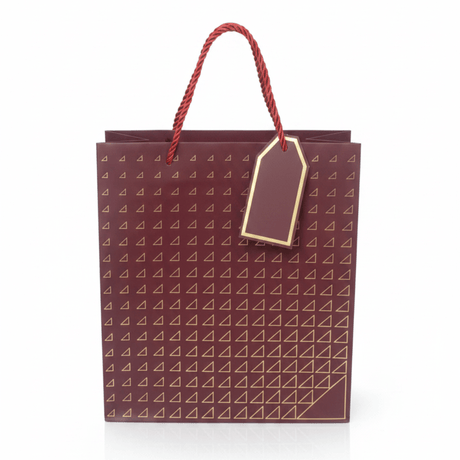 Paper Gift Bag with Gold Triangle Pattern & Rope Handles – 32×26cm | Premium Gift Packaging for All Occasions - Al Kabayel Discount CentrePaper Gift Bag with Gold Triangle Pattern & Rope Handles – 32×26cm | Premium Gift Packaging for All OccasionsPacking & Wrapping SuppliesAKDCAl Kabayel Discount Centre