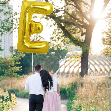 PARTY POINT Gold Foil Balloon Letter "E" 80cm – Elegant Gold Décor for Events - Al Kabayel Discount CentrePARTY POINT Gold Foil Balloon Letter "E" 80cm – Elegant Gold Décor for EventsParty SuppliesPARTY POINTAl Kabayel Discount Centre