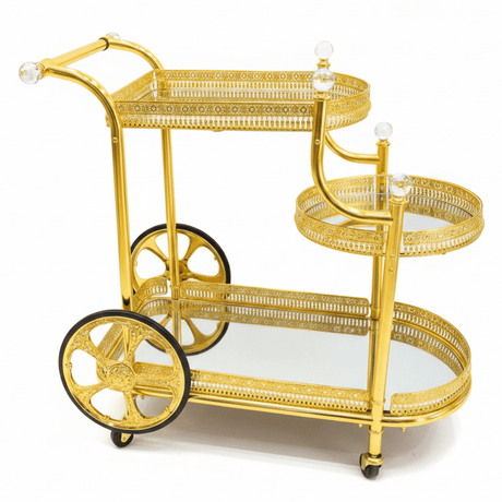 Pilsco 3-Tier Gold Metal & Mirror Glass Serving Trolley Cart | Ornate Filigree Design with Crystal Finials & Decorative Wheels | Luxury Hospitality & Majlis Tea Trolley | 80 x 80x 50 cm - Al Kabayel Discount CentrePilsco 3-Tier Gold Metal & Mirror Glass Serving Trolley Cart | Ornate Filigree Design with Crystal Finials & Decorative Wheels | Luxury Hospitality & Majlis Tea Trolley | 80 x 80x 50 cmOrganizers & AccessoriesPILSCOAl Kabayel Discount Centre