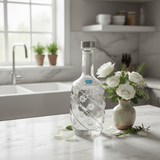Pishgaman Elegant Embossed Floral Glass Water Bottle 1 Litre – Premium Crystal-Clear Carafe with Silver Lid for Home, Dining & Gifting - Al Kabayel Discount CentrePishgaman Elegant Embossed Floral Glass Water Bottle 1 Litre – Premium Crystal-Clear Carafe with Silver Lid for Home, Dining & GiftingWater BottlePISHGAMANAl Kabayel Discount Centre