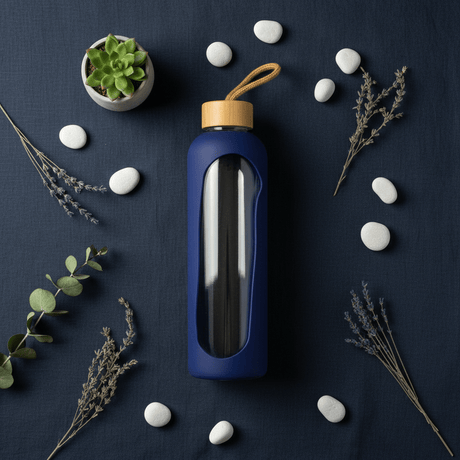 Plain Glass Water Bottle with Navy Blue Silicone Grip Cover – 28 cm - Al Kabayel Discount CentrePlain Glass Water Bottle with Navy Blue Silicone Grip Cover – 28 cmWater BottlesAKDCAl Kabayel Discount Centre