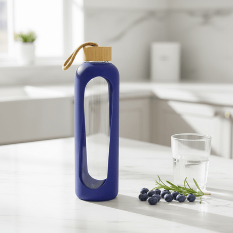 Plain Glass Water Bottle with Navy Blue Silicone Grip Cover – 28 cm - Al Kabayel Discount CentrePlain Glass Water Bottle with Navy Blue Silicone Grip Cover – 28 cmWater BottlesAKDCAl Kabayel Discount Centre