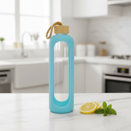 Plain Glass Water Bottle with Sky Blue Protective Silicone Cover – 28 cm - Al Kabayel Discount CentrePlain Glass Water Bottle with Sky Blue Protective Silicone Cover – 28 cmWater BottlesAKDCAl Kabayel Discount Centre