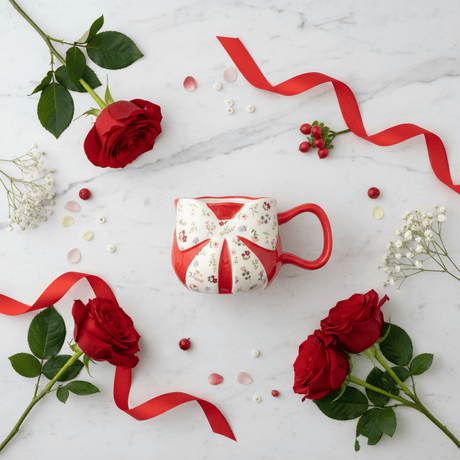 Red Bow Ceramic Mug — Floral Elegance Edition | 300ml - Al Kabayel Discount CentreRed Bow Ceramic Mug — Floral Elegance Edition | 300mlMugsAKDCAl Kabayel Discount Centre