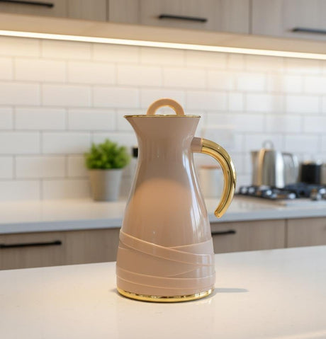 Rejal 1 Liter Luxury Vacuum Flask – Rosy Brown Shade with Gold Finish, Stylish Design for Tea & Coffee Serving - Al Kabayel Discount CentreRejal 1 Liter Luxury Vacuum Flask – Rosy Brown Shade with Gold Finish, Stylish Design for Tea & Coffee ServingThermosREJALAl Kabayel Discount Centre
