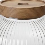 Ribbed Glass Jar with Wooden Lid - 10×7cm - Al Kabayel Discount CentreRibbed Glass Jar with Wooden Lid - 10×7cmJars & Food SaversAKDCAl Kabayel Discount Centre