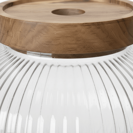 Ribbed Glass Jar with Wooden Lid - 10×7cm - Al Kabayel Discount CentreRibbed Glass Jar with Wooden Lid - 10×7cmJars & Food SaversAKDCAl Kabayel Discount Centre
