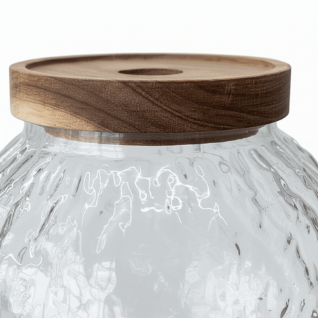 Round Textured Glass Jar with Wooden Lid - 14×9cm - Al Kabayel Discount CentreRound Textured Glass Jar with Wooden Lid - 14×9cmJars & Food SaversAKDCAl Kabayel Discount Centre