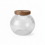 Round Textured Glass Jar with Wooden Lid - 14×9cm - Al Kabayel Discount CentreRound Textured Glass Jar with Wooden Lid - 14×9cmJars & Food SaversAKDCAl Kabayel Discount Centre