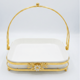 Silu White Ceramic Square Serving Tray with Ornate Golden Metal Arch Handle & Lotus Base — 10 Inch - Al Kabayel Discount CentreSilu White Ceramic Square Serving Tray with Ornate Golden Metal Arch Handle & Lotus Base — 10 InchServing TraysSILUAl Kabayel Discount Centre