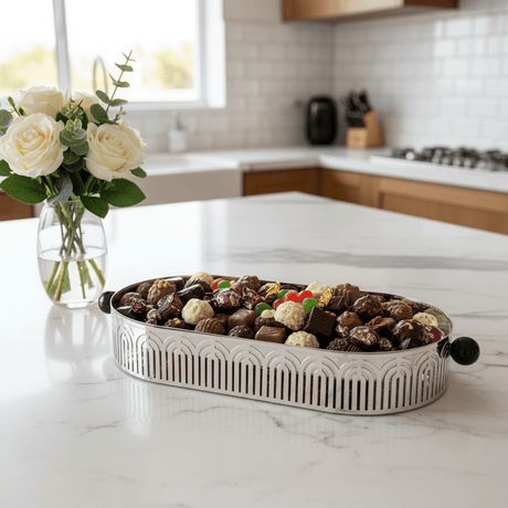 Silver Metal Oval Candy & Serving Tray with Elegant Black Handles | Ornate Arch Cutout Design | 30×15cm | - Al Kabayel Discount CentreSilver Metal Oval Candy & Serving Tray with Elegant Black Handles | Ornate Arch Cutout Design | 30×15cm |Serving TraysAKDCAl Kabayel Discount Centre
