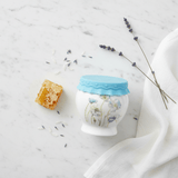 Solecasa White Ceramic Honey Jar with Flower Design & Blue Silicone Lid — 300ml - Al Kabayel Discount CentreSolecasa White Ceramic Honey Jar with Flower Design & Blue Silicone Lid — 300mlJars & Food SaversSOLECASAAl Kabayel Discount Centre