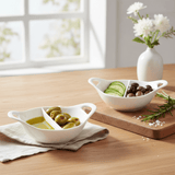 Symphony Handles Divided Dip Bowl Set – 2 White Ceramic Bowls (12.5×15.5 cm) - Al Kabayel Discount CentreSymphony Handles Divided Dip Bowl Set – 2 White Ceramic Bowls (12.5×15.5 cm)BowlsSYMPHONYAl Kabayel Discount Centre