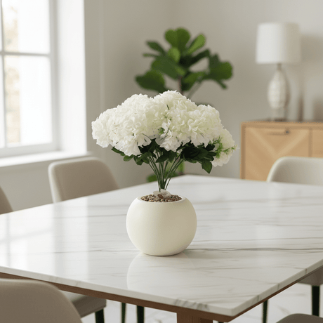 White Artificial Hydrangea Arrangement | Cream Sphere Pot | 35cm - Al Kabayel Discount CentreWhite Artificial Hydrangea Arrangement | Cream Sphere Pot | 35cmArtificial FloraAKDCAl Kabayel Discount Centre