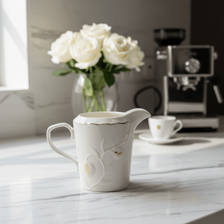 White Ceramic Creamer Jug with Gold Accent Design and Easy - Pour Handle – Stylish Milk Server (10×6 cm) - Al Kabayel Discount CentreWhite Ceramic Creamer Jug with Gold Accent Design and Easy - Pour Handle – Stylish Milk Server (10×6 cm)Jars & Food SaversAKDCAl Kabayel Discount Centre