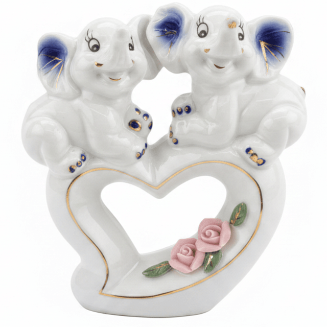 White Ceramic Elephant Couple Figurine – Heart & Rose Décor Piece, 13cm - Al Kabayel Discount CentreWhite Ceramic Elephant Couple Figurine – Heart & Rose Décor Piece, 13cmHome Décor AccentsAKDCAl Kabayel Discount Centre