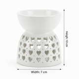 White Ceramic Oil Burner with Heart Cutout Design - 10×7 cm - Al Kabayel Discount CentreWhite Ceramic Oil Burner with Heart Cutout Design - 10×7 cmHome Décor AccentsAKDCAl Kabayel Discount Centre