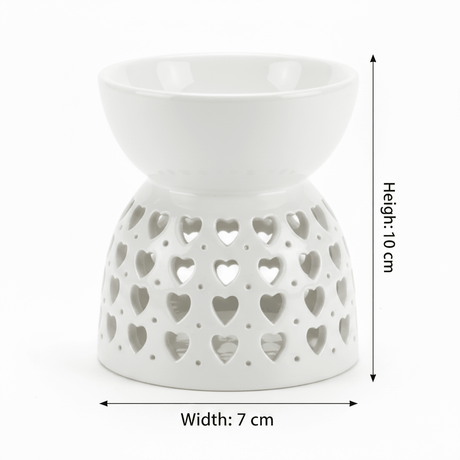 White Ceramic Oil Burner with Heart Cutout Design - 10×7 cm - Al Kabayel Discount CentreWhite Ceramic Oil Burner with Heart Cutout Design - 10×7 cmHome Décor AccentsAKDCAl Kabayel Discount Centre