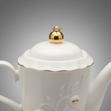 White Ceramic Teapot with Sophisticated Gold Detailing and Lid – Elegant Tea Serving Pot (17 cm) - Al Kabayel Discount CentreWhite Ceramic Teapot with Sophisticated Gold Detailing and Lid – Elegant Tea Serving Pot (17 cm)Tea/Coffee PotsAKDCAl Kabayel Discount Centre