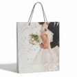 White Elegant Paper Gift Bag with Rope Handles | Wedding & Bridal Design | 32×26cm | Premium Glossy Finish - Al Kabayel Discount CentreWhite Elegant Paper Gift Bag with Rope Handles | Wedding & Bridal Design | 32×26cm | Premium Glossy FinishPacking & Wrapping SuppliesAKDCAl Kabayel Discount Centre