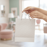 White Embossed Flower Paper Gift Bag | Premium Luxury Packaging Bag with Rope Handles | 30×25cm | - Al Kabayel Discount CentreWhite Embossed Flower Paper Gift Bag | Premium Luxury Packaging Bag with Rope Handles | 30×25cm |Packing & Wrapping SuppliesAKDCAl Kabayel Discount Centre