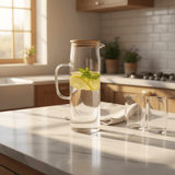 Yuniverse Modern Clear Glass Water Jug with Natural Wooden Lid – Minimalist Beverage Server (1.5 L) - Al Kabayel Discount CentreYuniverse Modern Clear Glass Water Jug with Natural Wooden Lid – Minimalist Beverage Server (1.5 L)JugsYUNIVERSEAl Kabayel Discount Centre